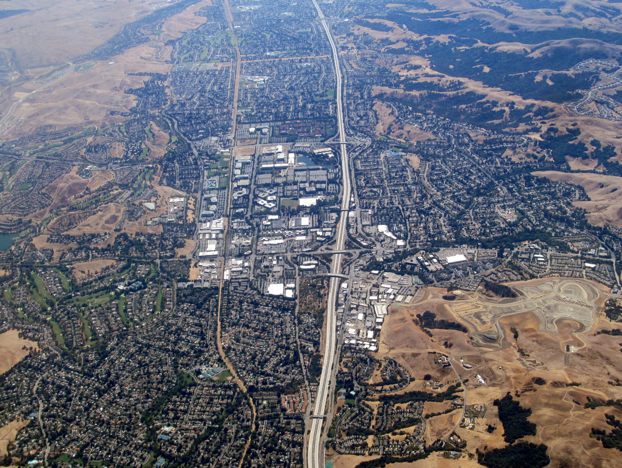 Aerial view of San Ramon looking south with I-680 through the center, September 2017