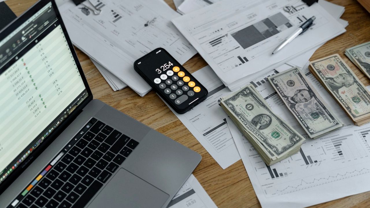Calculator and financial papers for home pricing
