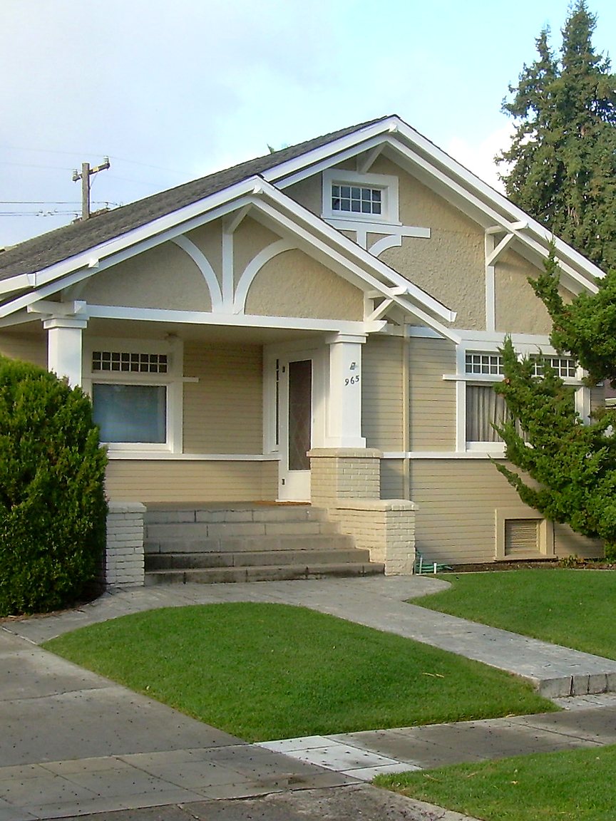 Bay Area Craftsman bungalow with front porch and green lawn